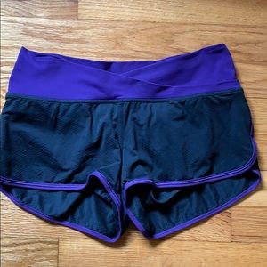 Purple and black running shorts